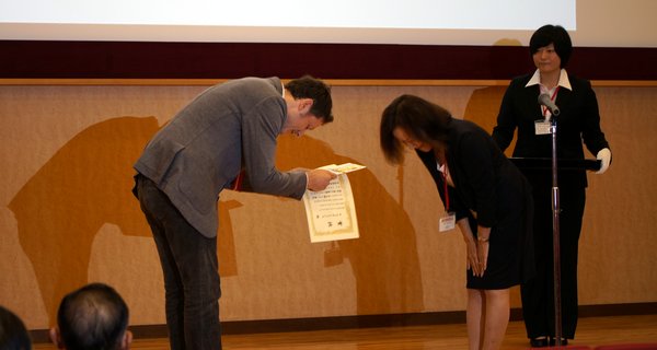 Andrew MacIntosh receiving the Takashimia Prize